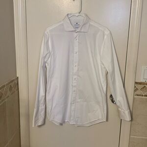 Men’s white button down dress shirt. Brand is Ryan Seacrest distinction.